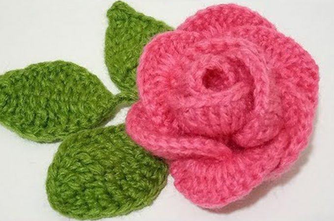 Crochet Rose Featured Image - This lovely crochet rose with leaves is creative and decorative for many crochet projects. Crocheting a rose is fun, easy, and makes the perfect embellishment for accessories and more!