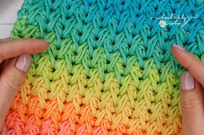 Crochet Feather Stitch Featured Image - Learn how to make the stunning crochet feather stitch by watching this video tutorial! This stitch has a beautiful texture and is the same on both sides!