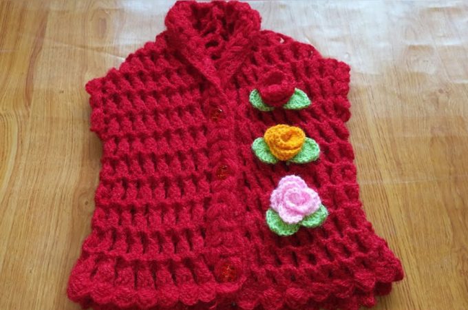 Crochet Baby Sweater Featured Image - Learn how to make this beautiful crochet baby sweater! This baby sweater makes the cutest gift for the precious newborn girls in your lives and toddlers.