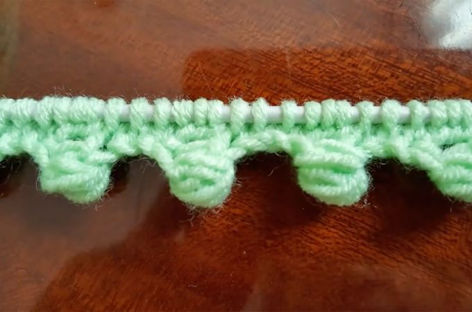 Knitting Edge Featured Image - This beautiful knitting edge is a popular project because it beautifies objects and accessories. Watch this video tutorial to learn how to make this edge.