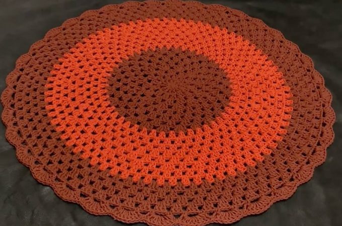 Crochet Round Rug Featured Image - Learn how to work this useful and lovely petite crochet round rug by watching this free video tutorial! Keep reading for tips on how to master the techniques of this great rug.