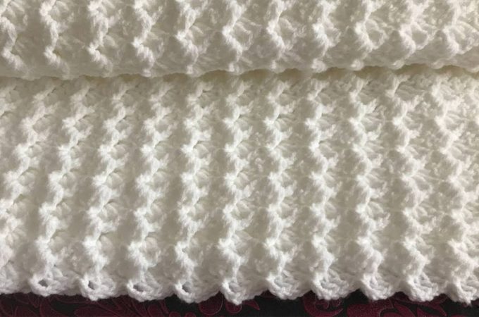 Large Crochet Blanket Featured Image - This tutorial will walk you through this beautiful large crochet blanket. This soft blanket has the most interesting texture of any crochet pattern I have encountered!