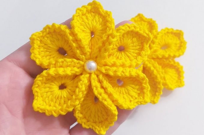 Simple Crochet Flower Featured Image - These simple crochet flowers are creative and decorative for so many crochet projects. These flowers make the perfect embellishment for accessories!