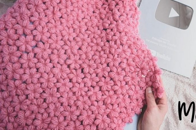 Crochet Puff Flower Blanket Featured Image- This video tutorial will walk you through the beautiful crochet puff flower blanket. It pops out on both sides of the work and has a soft look and feel.