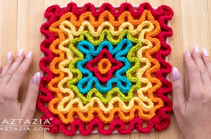 Crochet Wavy Pad Featured Image - Learn how to make this colourful crochet wavy pad. Watch the free English video tutorial for a full step by step tutorial on how to make a lovely wavy pad.