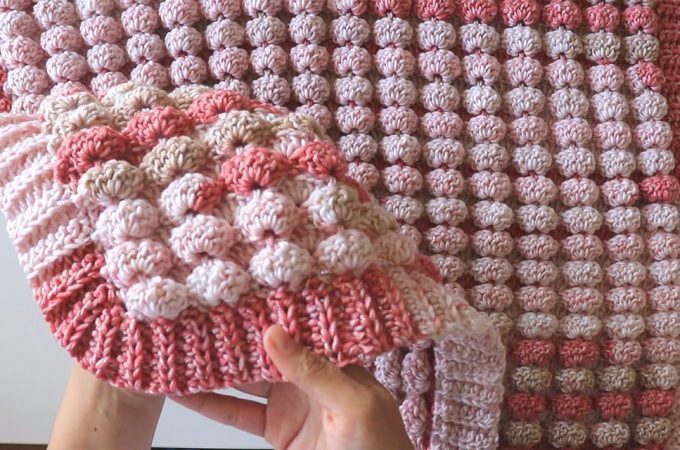 Crochet Candy Blanket Featured - This English video tutorial will walk you through the most beautiful and very easy crochet candy blanket. This crochet blanket has an interesting 3D puff texture.