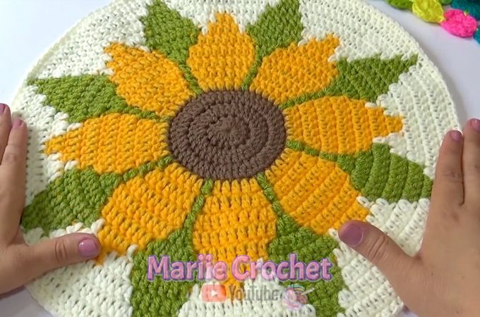 Crochet Sunflower Coaster Featured - Learn how to make the beautiful crochet sunflower coaster for year round holidays and celebrations. Watch this free video tutorial in English subtitles to learn how to easily make this coaster.