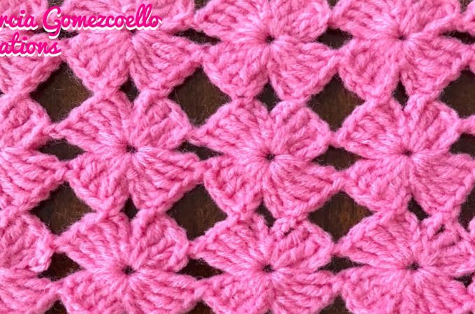 Crochet 4 Petals Flower Featured - These gorgeous crochet 4 petal flowers are creative and decorative for so many crochet projects. Crocheting flowers is an enjoyable beginner stitch and it makes the perfect embellishment for accessories!