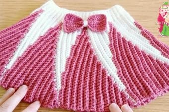 Easy Crochet Skirt Featured - Make this easy crochet skirt for any special person in your life. This skirt is so easy and fun to crochet, you are going to want to make more! Watch this tutorial to learn how to make this beautiful crochet skirt.