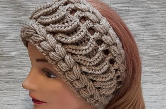 Easy Crochet Headband Featured - This easy crochet headband is the perfect accessory to keep you warm and in style! The tutorial will dive into the details of how to work up this crochet headband in no time!