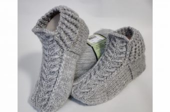Knitted Slipper Socks Featured - Knitted slipper socks for babies and kids are the cutest things! These socks will look adorable on your newborn nieces and nephews, grandchildren, or any sweet child in your life!