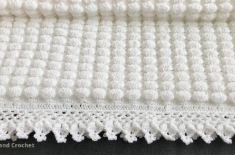 Bobble Stitch Crochet Blanket Featured - This tutorial will walk you through the beautiful bobble stitch crochet blanket. This soft blanket has the most interesting texture of any crochet pattern I have encountered!
