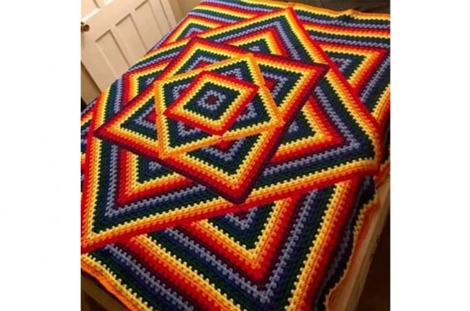 Crochet Granny Square Blanket Featured - This crochet granny square blanket tutorial is super easy to follow and has plenty of instructions. The final look of the fabric is dense and thicker.