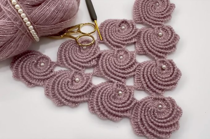 Crochet Oyster Shawl Motif Featured - This guide takes you on a journey through the mesmerizing world of crafting your very own crochet oyster shawl motif.