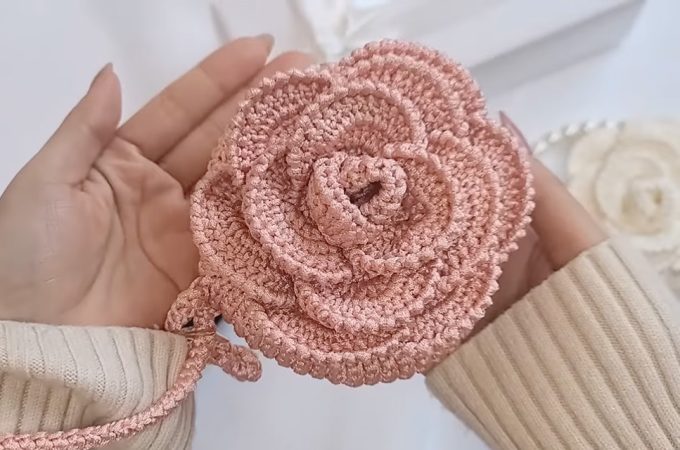 Crochet Flower Mini Bag Featured - In this tutorial, we'll explore the step-by-step process of crafting this adorable crochet flower mini bag that adds a touch of whimsy to any ensemble.