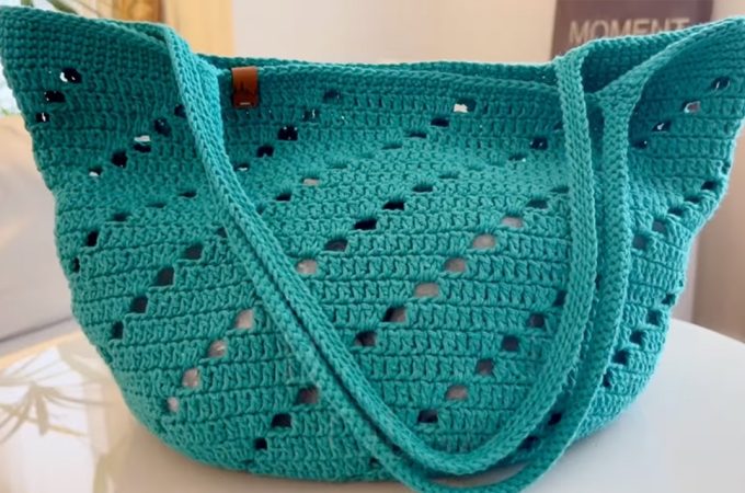 Crochet Summer Handbag Featured - In the realm of crochet, where threads weave tales of creativity, the summer handbag emerges as a canvas of endless possibilities.
