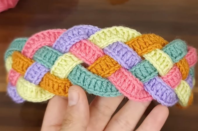 Crochet Hair Band Featured - Elevate your style with a touch of handmade elegance by making a unique crochet hair band featuring interwoven straps in vibrant colors.