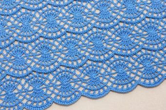 Crochet Lace Waves Motif Featured - The world of crochet is vast and filled with enchanting patterns and motifs, but the crochet lace waves motif stands out for its delicate beauty and rhythmic flow.