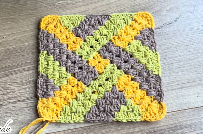 Crochet Multicolor Granny Square Featured - The crochet multicolor granny square is a versatile and visually stunning pattern that has captivated crafters for decades.