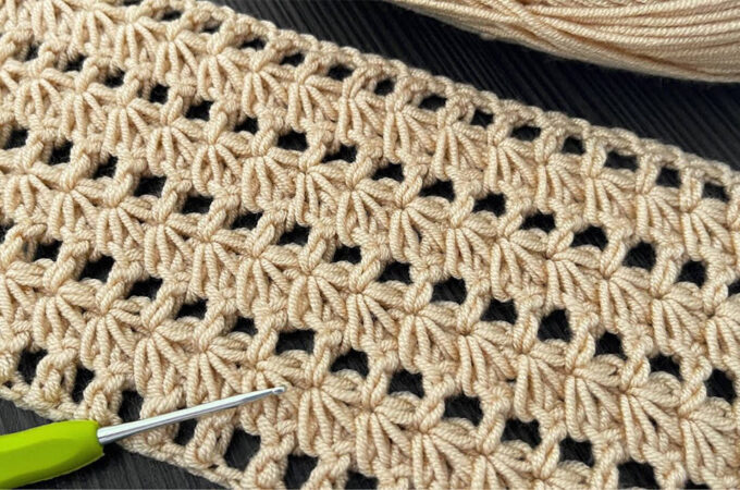 Crochet Star Lace Stitch Featured - The crochet star lace stitch is a mesmerizing combination of delicate loops and airy spaces, creating a breathtaking openwork pattern.