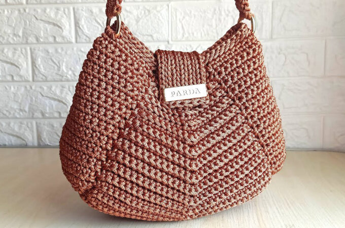 Crochet Women Bag Featured - A crochet women bag isn’t just an accessory; it’s a statement piece, a testament to craftsmanship, and a practical yet stylish companion for any occasion.