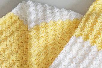Crochet Blanket Stitch Featured - If you’re searching for a stitch that’s both textured and beginner-friendly, look no further than the crochet blanket stitch.