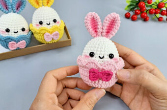 Crochet Easter Egg Featured - Easter is a time for bright colors, sweet treats, and of course, bunnies galore. And what better way to bring handmade charm into the season than with a cheerful crochet Easter egg—with a twist!