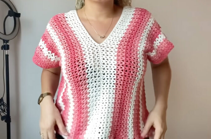 Crochet V Neck Top Featured - There's something magical about the simple elegance of a crochet V neck top. It embodies the spirit of effortless summer days, relaxed creativity, and timeless fashion.