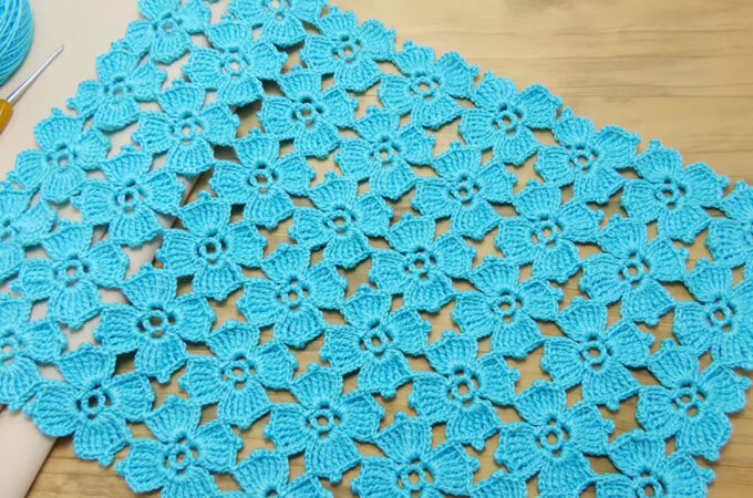 Crochet Openwork Flower Motif Featured - There’s something undeniably charming about a crochet openwork flower motif. Light, airy, and bursting with texture, this motif is more than just decorative—it’s a celebration of craftsmanship, color, and creativity.