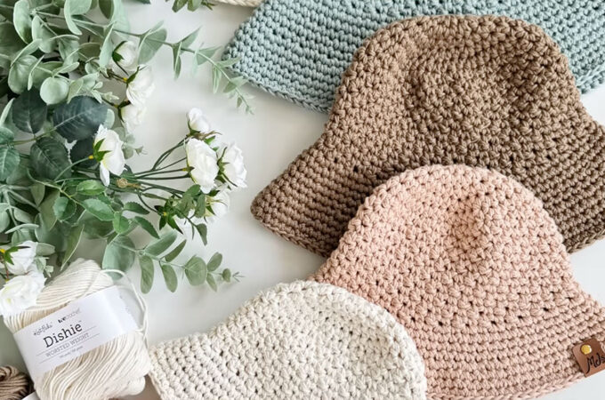 Crochet Sunhat Featured - When the sun beams high and the breeze carries whispers of lavender and ocean spray, there’s one accessory that effortlessly combines charm and utility: the crochet sunhat.