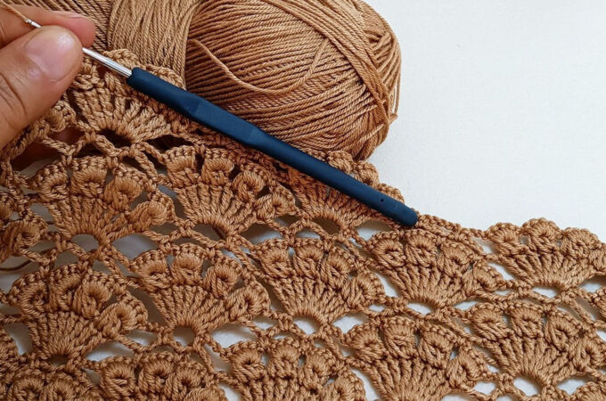 Crochet Lace Fan Pattern Featured - The crochet lace fan pattern is one of those timeless stitches that instantly elevates any handmade project. Its graceful arches and delicate spacing mimic the unfolding of a hand fan, creating a fabric that feels both intricate and airy.