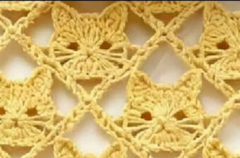Crochet Cat Motif Featured - A crochet cat motif combines elegance, playfulness, and creativity in one delightful design. There is something irresistibly whimsical about transforming yarn into tiny feline faces.
